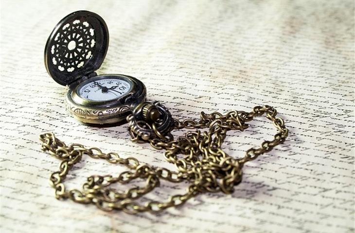 gold pocket watch and chain
